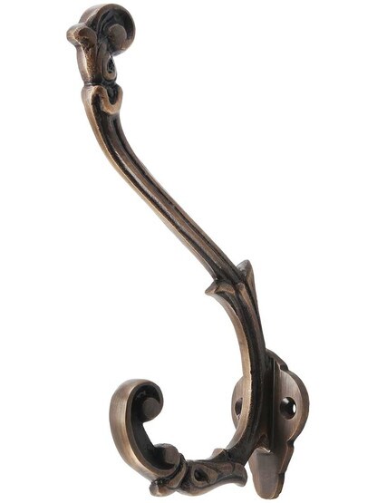 Solid Brass Decorative Coat Hook in Antique Brass.